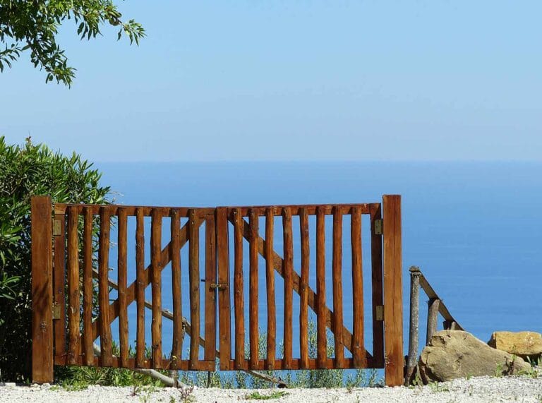 Luxury villa terrace gate overlooking Cefalu Mediterranean sea view in Sicily