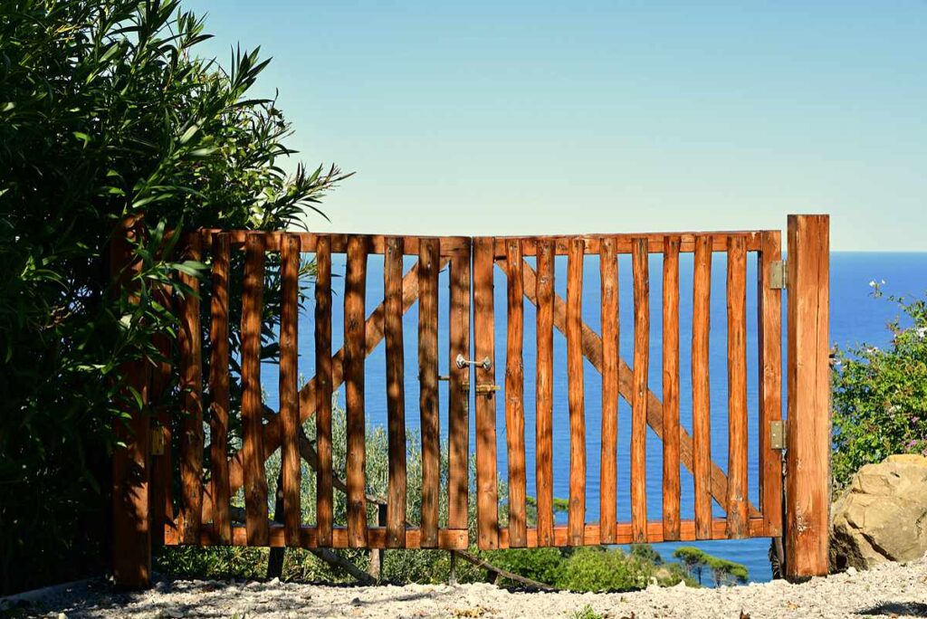 Luxury villa terrace gate overlooking Cefalu Mediterranean sea view in Sicily