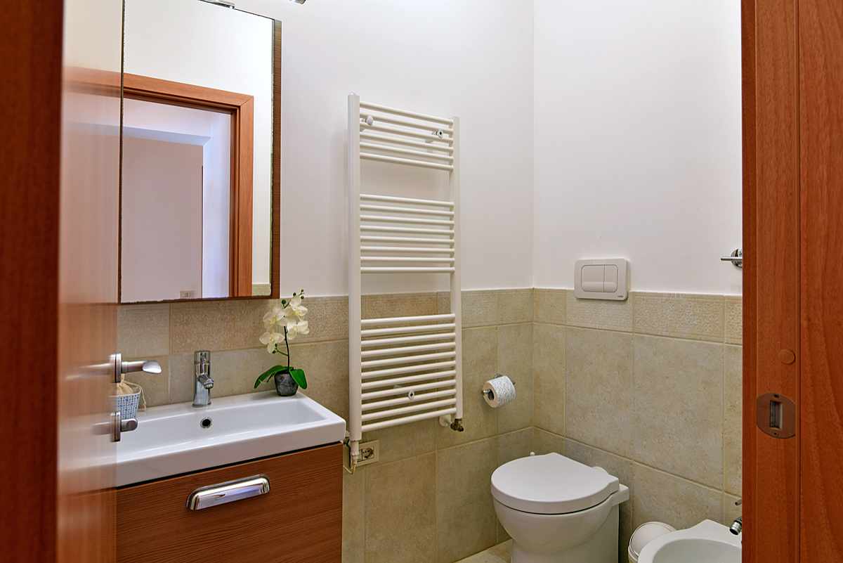 Villa Splendida modern bathroom with rainfall shower and premium fixtures